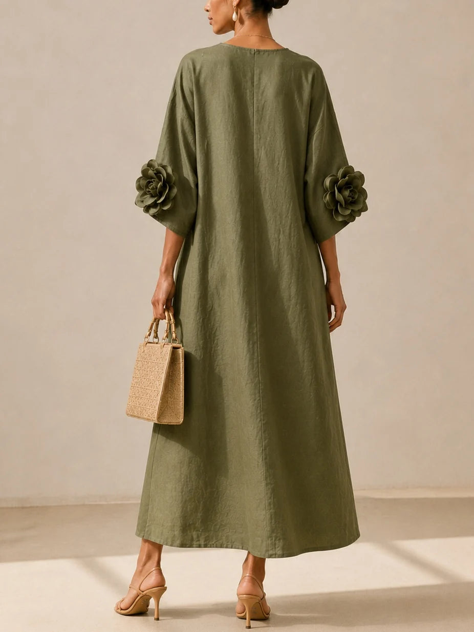 Vestido midi verde oliva con escote en V y llamativos puños florales.