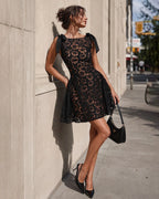 Mini vestido jacquard con cuello barco negro