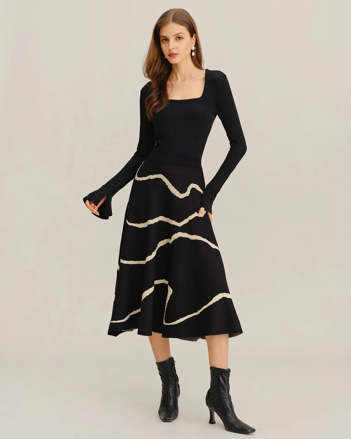 Falda midi con cintura elástica geométrica negra