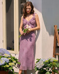 Vestido midi con tirantes florales morados