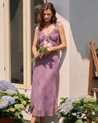 Vestido midi con tirantes florales morados
